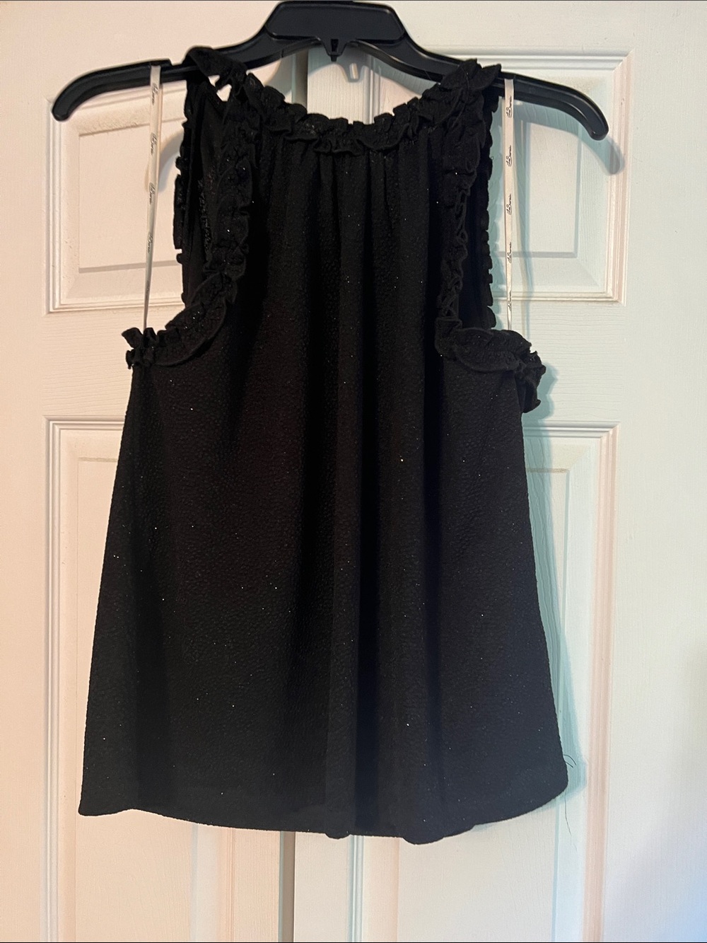 Black Ruffle-Trim Sleeveless Blouse
